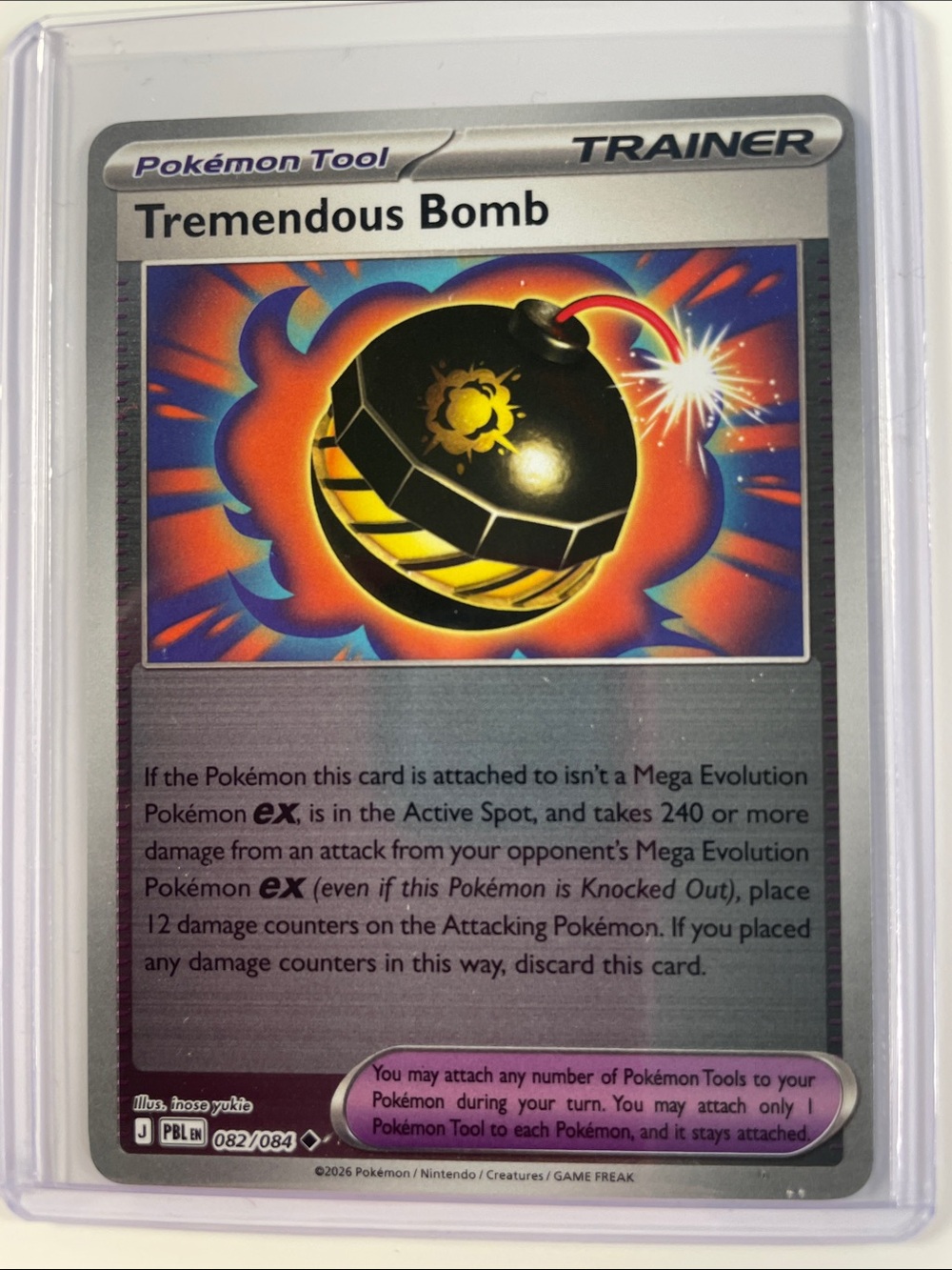 Pokemon Tremendous Bomb Trainer Card - Black, Yellow, Red, Blue